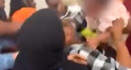 Bare-knuckle brawl breaks out at kindergarten graduation as a BABY is pulled out from the middle of the melee
