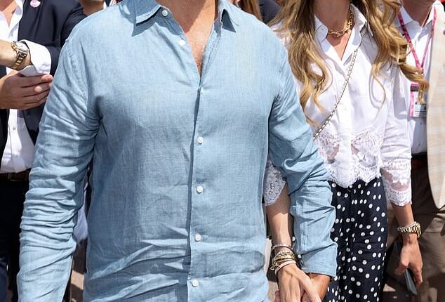 Beaming newlyweds Bettina and Don Trump Jr were seen getting cozy in the sunshine at the Monaco Grand Prix on Sunday after tying the knot in West Palm Beach late last month