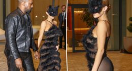 Bianca Censori gets frisky in a cat face mask with sheer dress — and nothing underneath
