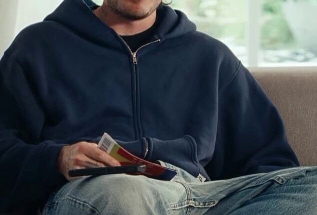 The eldest Beckham son, 27, was seen smirking in sponsored video as he said: 'You're probably wondering why I'm watching the FIFA World Cup 2026 from home... It's a long story'