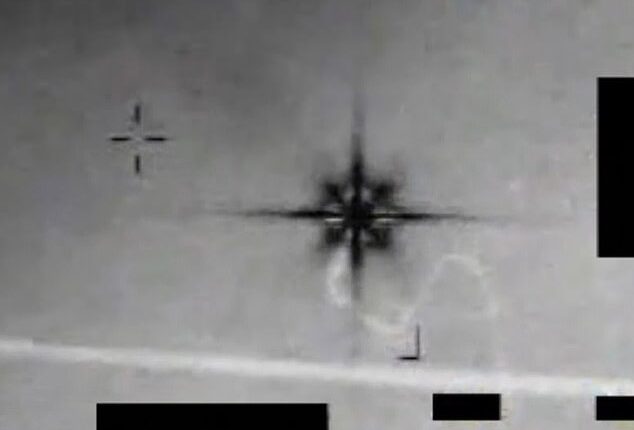 A video released in the first wave of UFO files appeared to show a glowing object resembling an 'eight-pointed star' with uneven arms moving across the sky
