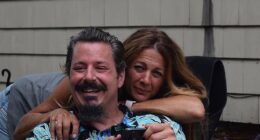 Paul Kueker, 51 seen with his sister Kricket Kueker Kent, plummeted 150 feet from the Chase Bridge at a Goose concert shortly before 10pm on Saturday