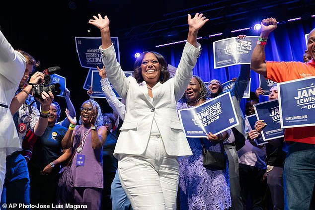 D.C. Council member Janeese Lewis George waves at an Election Night party at Howard Theatre Tuesday after early returns showed her garnering more than 50 percent of the vote to be Washington, DC's next mayor