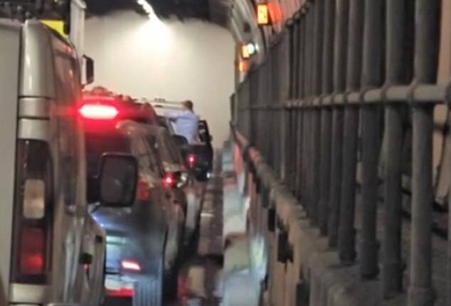 Motorists were forced out of their cars on to the side of the tunnel as they were told to evacuate