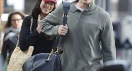 Dua Lipa and Callum Turner couldn't stop smiling as they arrived at Luton Airport ahead of their flight to Sicily on a private jet