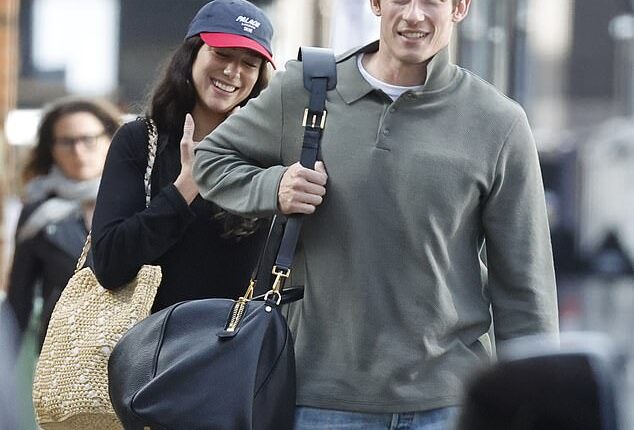 Dua Lipa and Callum Turner couldn't stop smiling as they arrived at Luton Airport ahead of their flight to Sicily on a private jet
