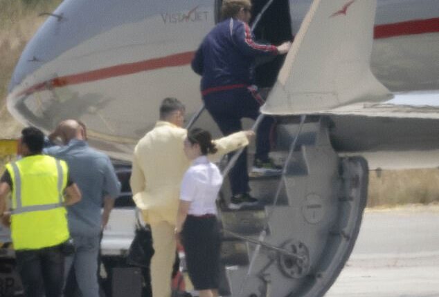 Music legend Sir Elton John has been seen boarding a private jet after performing at Dua Lipa's wedding