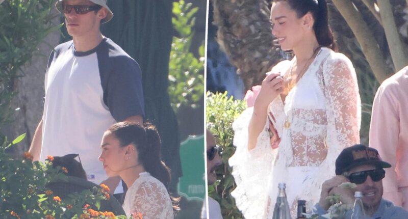 Dua Lipa radiates bridal vibes in white lace dress following wedding to Callum Turner