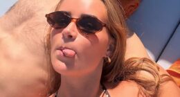 Rasmus Hojlund - pictured on holiday with girlfriend Laura Rhod Sondergaard at the weekend - is leaving Man United on a permanent transfer to Napoli