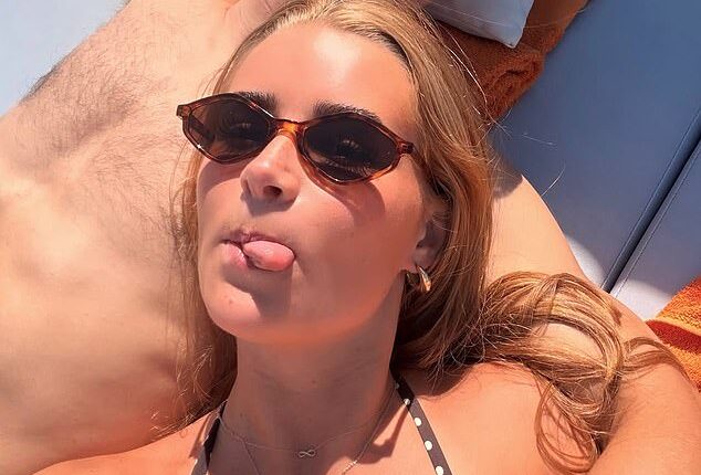 Rasmus Hojlund - pictured on holiday with girlfriend Laura Rhod Sondergaard at the weekend - is leaving Man United on a permanent transfer to Napoli
