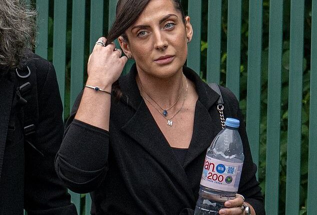Michelle Molver, 30, admitted to 'kissing' and sending letters to murderer Kemai Mathurine, 23, while working at Belmarsh Prison but denies the charge of misconduct in a public office. Here she is pictured outside Woolwich Crown Court today