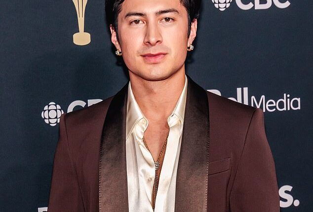 Actor Hudson Williams, 25, has come under fire for being seen in a resurfaced photo with a drawing of a swastika on his head, but insiders close to the actor say he wasn't aware it was there. Pictured May 31 at the Canadian Screen Awards in Ontario