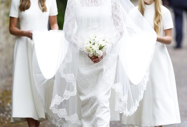 Here comes the bride! Harriet Sperling is the epitome of a bridal beauty in a traditional lace gown and glittering tiara as she arrives at her royal wedding to Peter Phillips alongside guests King Charles and Kate