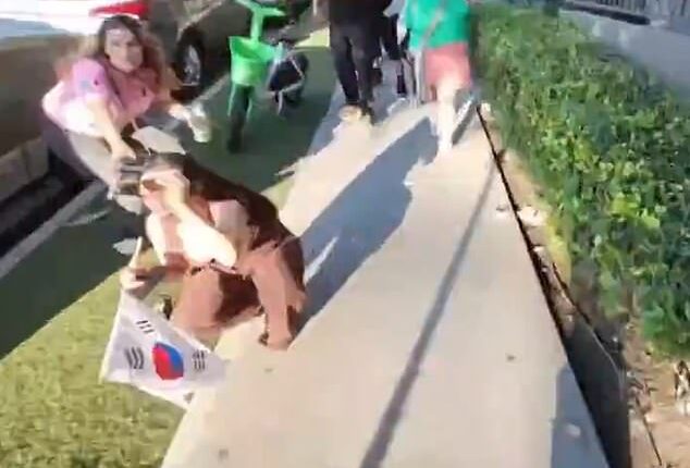 Onlookers cower in fear as content creator, Cellfmade, flees the shooting in Koreatown