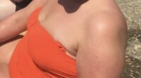 Emily Larner in Greece in 2019, weighing 17-and-a-half stone and wearing her flesh-covering bright orange swimsuit. ¿I felt deeply uncomfortable in my own skin,¿ she says