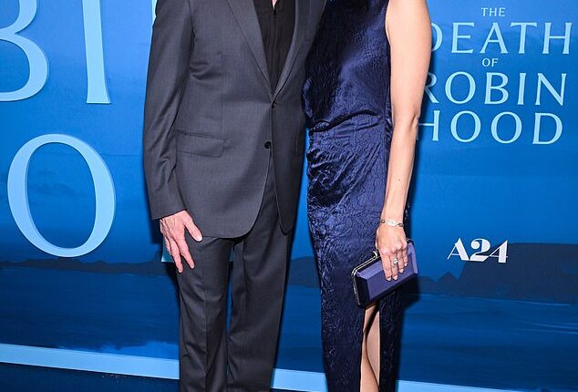 Hugh Jackman and girlfriend Sutton Foster were seen looking cozy at the New York City premiere of his new film The Death of Robin Hood on Wednesday, amid recent speculation about the state of their romance