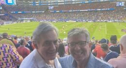 Former Prime Minister Gordon Brown (left) with Daily Mail Chief Sports Writer Oliver Holt (right)