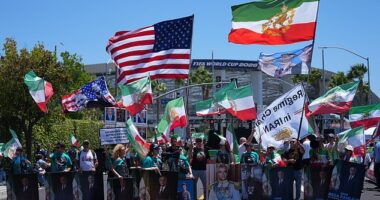 Protestors gather outside SoFi Stadium ahead of Iran's World Cup clash with New Zealand