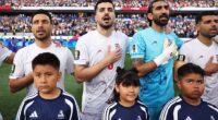 (L-R) Shoja Khalilzadeh, Saeid Ezatolahi, Alireza Beiranvand and Mehdi Taremi of IR Iran line up for the national anthem before the FIFA World Cup 2026 Group G match against New Zealand