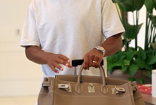England striker Ollie Watkins travelled in style with a Hermes Birkin HAC 50 worth approximately £65,000