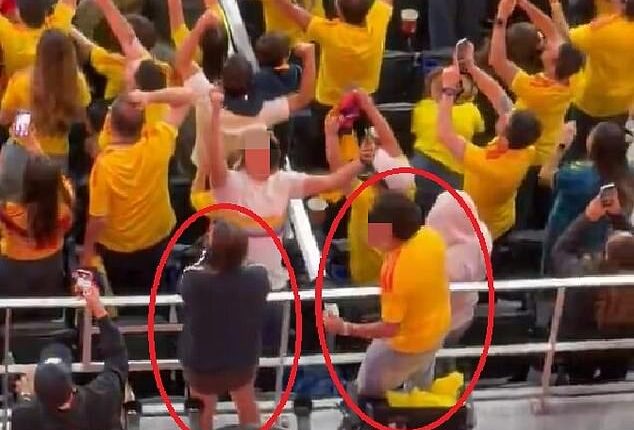 Wheelchair users were filmed standing up and bouncing in celebration after their football team won a World Cup match