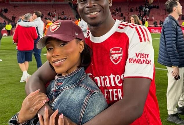 Arsenal and England winger Bukayo Saka pictured with his girlfriend Tolami Benson