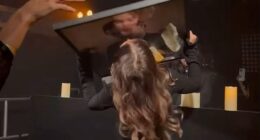 Jake Hall's ex-girlfriend Chloe Lewis was filmed kissing a photo of the late star as she danced to a DJ set at his 'unconventional funeral' on Friday