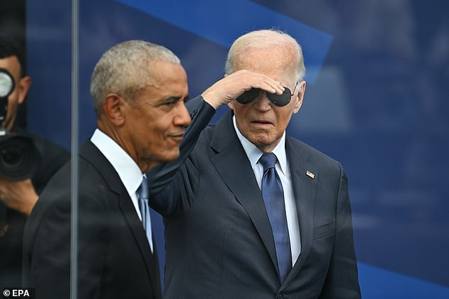 Joe Biden appeared confused and looking for direction after lingering on stage following the dedication ceremony at Barack Obama's presidential center in Chicago on Thursday