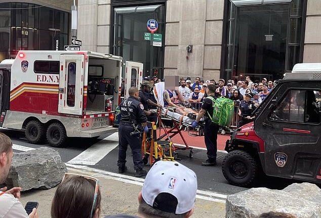 A fan required medical attention from EMTs while waiting for the Knicks' title parade to start