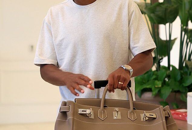 England striker Ollie Watkins travelled in style with a Hermes Birkin HAC 50 worth approximately £65,000
