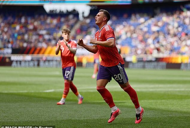 Lawrence Shankland celebrates scoring against Bolivia on Saturday night