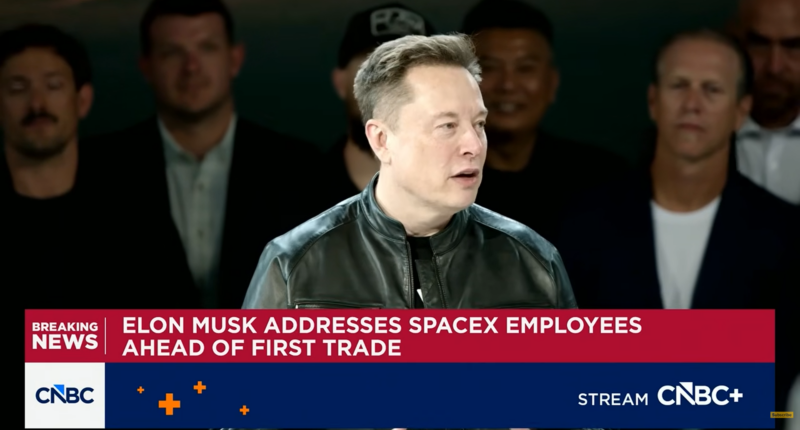 Elon Musk giving a speech.