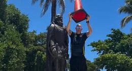 A Scottish fan was immediately confronted by Miami police after placing a cone on a statue