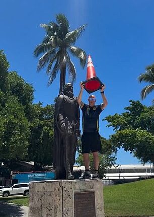 A Scottish fan was immediately confronted by Miami police after placing a cone on a statue