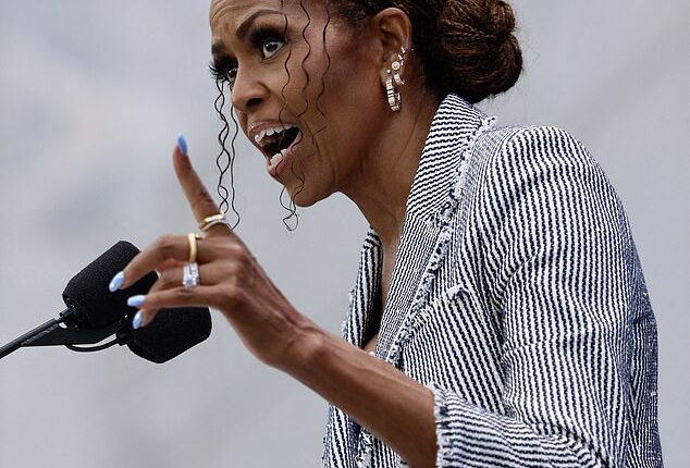 Former First Lady Michelle Obama took the podium on Thursday to praise her husband at the grand opening of his Presidential Center in Chicago