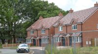 One migrant family has already moved into one of the properties ¿ but said they wished to leave the development because it was too 'remote'