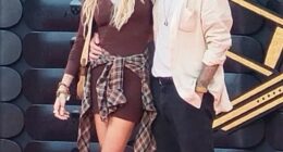 Paris Jackson has sparked romance rumours as she put on a cosy red carpet display with a mystery man at the Jackass premiere on Wednesday - one year after ending her engagement