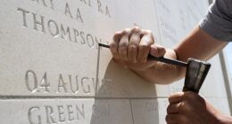 A trio of British engravers have been carefully hammering away at the stonework in a new section of the Normandy Memorial entitled ¿Addenda¿