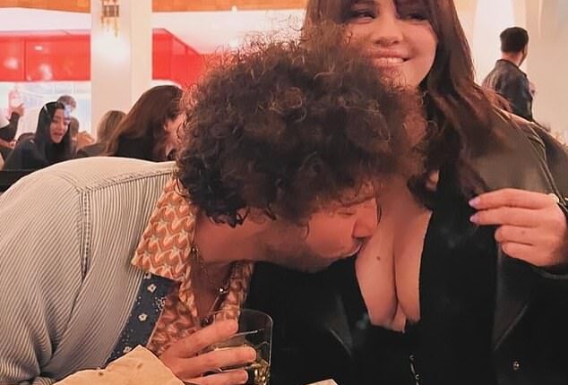 Selena Gomez shocked fans by sharing an image of husband Benny Blanco kissing her cleavage in a crowded restaurant this week