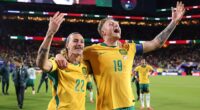 The Socceroos celebrated after securing a tense 0-0 draw with Paraguay to book their place in the World Cup knockout stages
