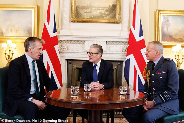 Keir Starmer staged an awkward photo op in No10 this morning with Dan Jarvis (left) and Chief of the Defence Staff Richard Knighton (right) - also thought to be at risk of quitting