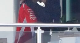 Kim Kardashian kisses Lewis Hamilton on his luxury yacht after attending the Monaco GP