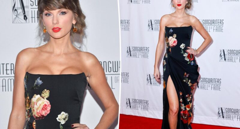 Taylor Swift blooms in black floral gown on Songwriters Hall of Fame Induction red carpet