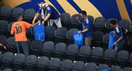 Japanese football fans have once again been hailed for their cleanliness after thousands arrived in Dallas armed with bin bags for their World Cup opener