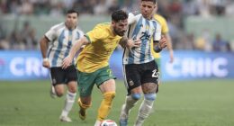 Mathew Leckie, pictured playing against Argentina, believes the Socceroos can surpass their memorable Qatar World Cup campaign