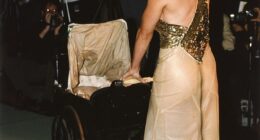 Madonna was wearing a chiffon gown and pushed a baby carriage with a little white dog inside