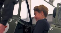 Prince George looked a picture of fascination as he stepped into the cockpit of a spitfire while on a poignant visit to RAF Coningsby for National Armed Forces Day