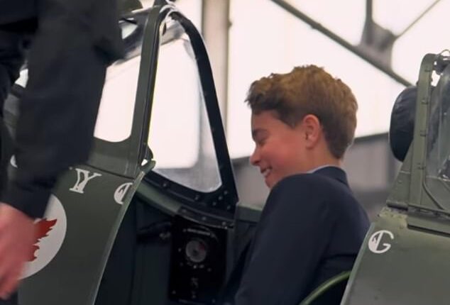 Prince George looked a picture of fascination as he stepped into the cockpit of a spitfire while on a poignant visit to RAF Coningsby for National Armed Forces Day