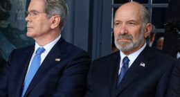 Treasury Secretary Scott Bessent (left) and Commerce Secretary Howard Lutnick (right) attend a meeting at the G7 in France earlier this month. A new book reveals that they had a Situation Room blowup in front of President Donald Trump in February 2025