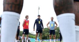 England managed (centre) is keen to protect star man and captain Harry Kane (right)